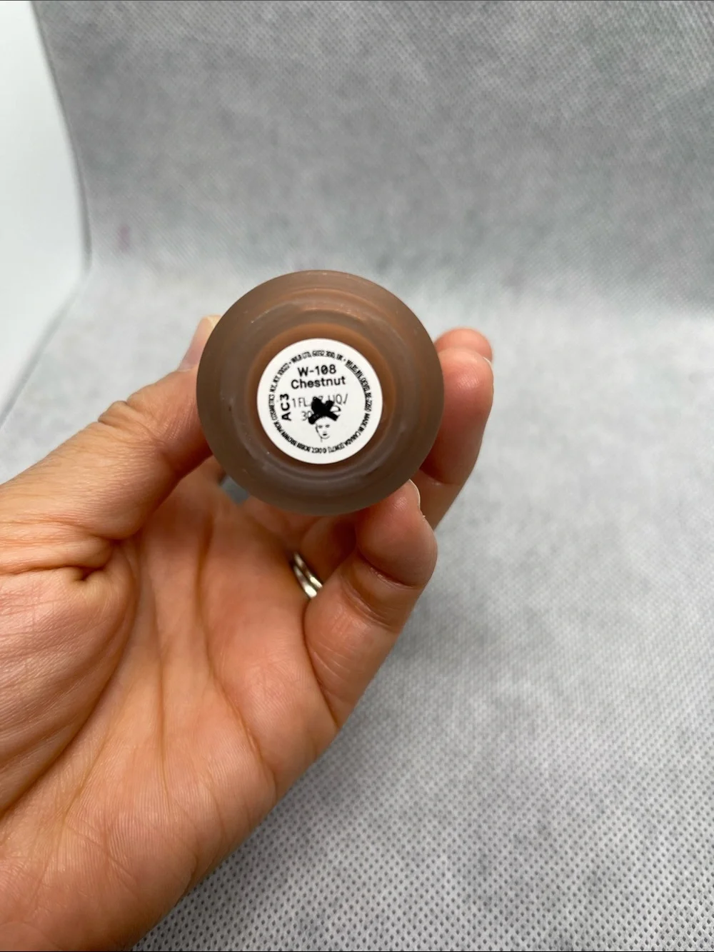 Bobbi Brown Weightless Skin Foundation - Warm Tan Bottle